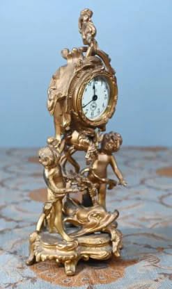 Discount Pamono American Rococo Style Gilt Mantel Clock with Cherub, 1920s
