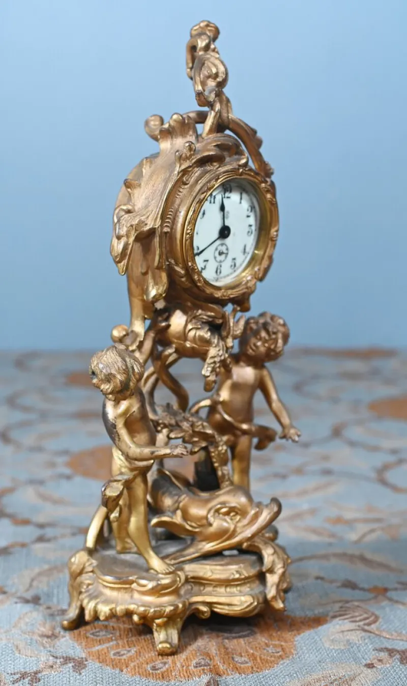 Discount Pamono American Rococo Style Gilt Mantel Clock with Cherub, 1920s
