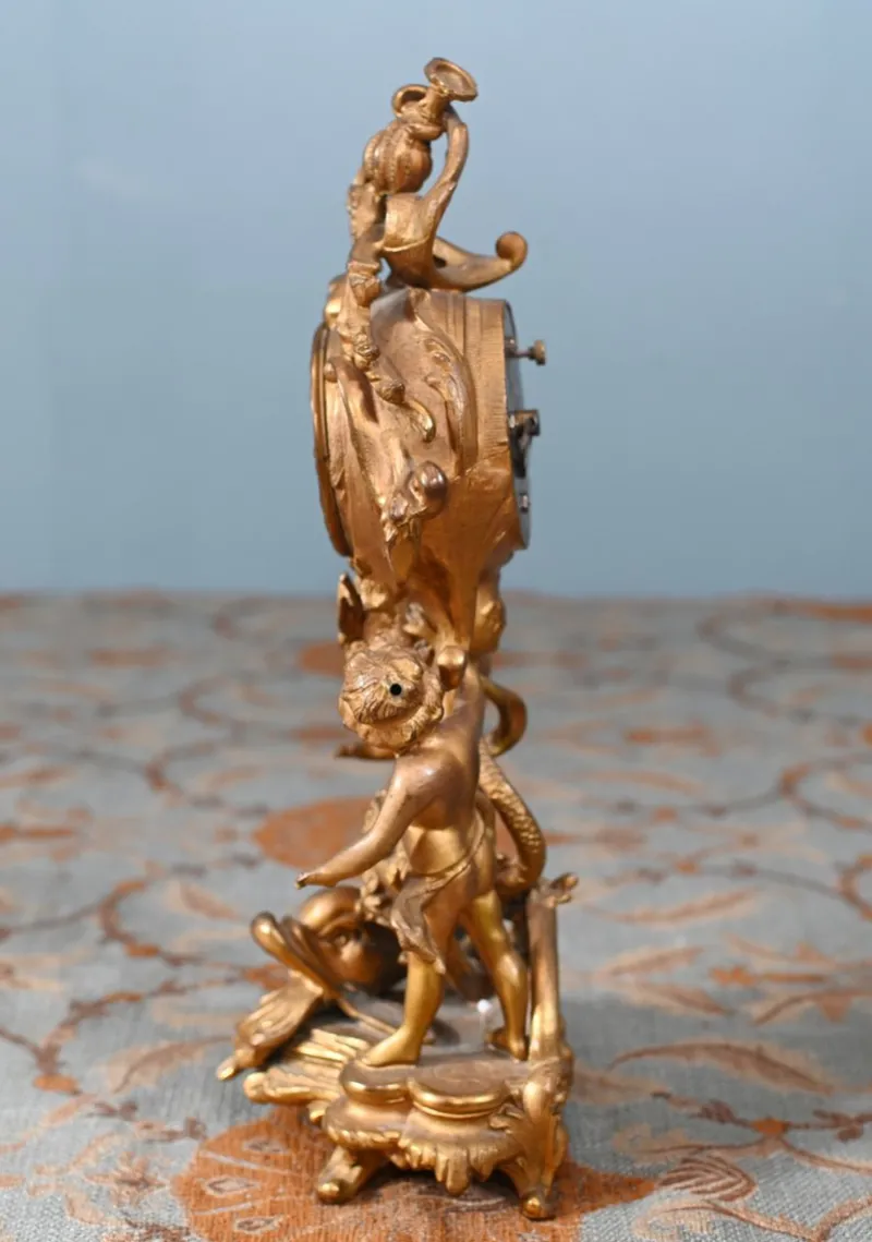Discount Pamono American Rococo Style Gilt Mantel Clock with Cherub, 1920s