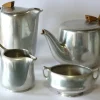 Clearance Pamono Art Nouveau English Aluminum Teak and Coffee Set from Picquot Ware, 1900s, Set of 4