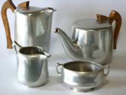 Clearance Pamono Art Nouveau English Aluminum Teak and Coffee Set from Picquot Ware, 1900s, Set of 4