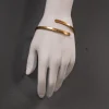 Pamono Brass Cuff Bracelet with Circles, 1980s> Bracelets