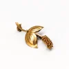 Pamono Brooch in 18k Gold> Brooches