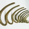 Pamono Coat Hooks in Brass by Franz Hagenauer for Werkstätte Hagenauer Wien, 1950s, Set of 9> Racks, Hooks & Valets