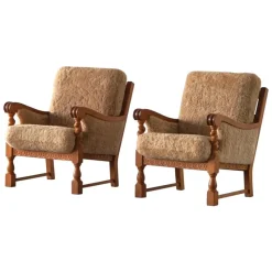 Pamono Danish Modern Lounge Chairs in Oak and Shearling Lambswool by Henning Kjærnulf, 1960s, Set of 2> Lounge Chairs & Armchairs