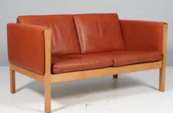 Hot Pamono Danish Two-Seat Sofa in Leather and Oak by Hans J. Wegner, 1960s