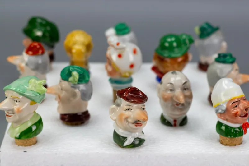 Pamono German Porcelain and Cork Bottle Stoppers, 1930s, Set of 13> Bottles, Carafes & Jugs