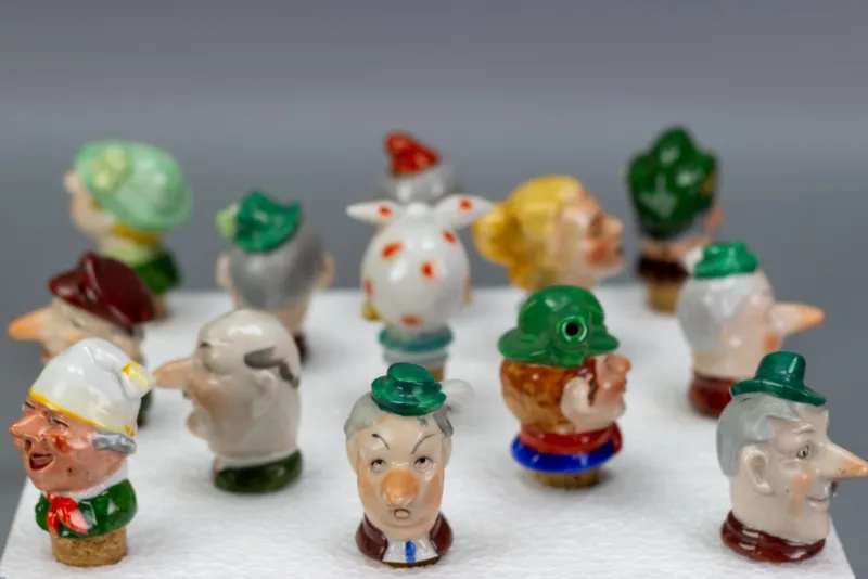 Pamono German Porcelain and Cork Bottle Stoppers, 1930s, Set of 13> Bottles, Carafes & Jugs