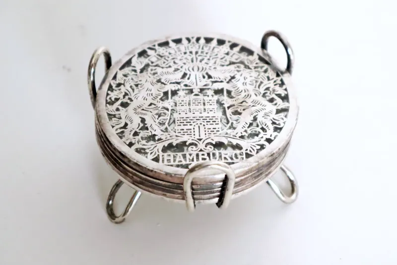 Pamono Glass Hamburg State Coat of Arms Coasters in Sterling Silver, 1960s, Set of 7> Dinnerware Accessories