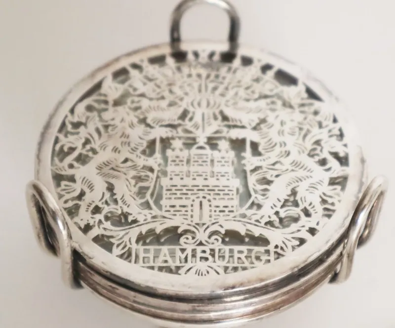 Pamono Glass Hamburg State Coat of Arms Coasters in Sterling Silver, 1960s, Set of 7> Dinnerware Accessories