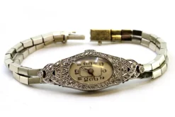 Pamono Gold and Platinum Watch with Cut-Out Case, Brilliant-Cut Diamonds and Double Parallel Bracelet><noscript><img width=