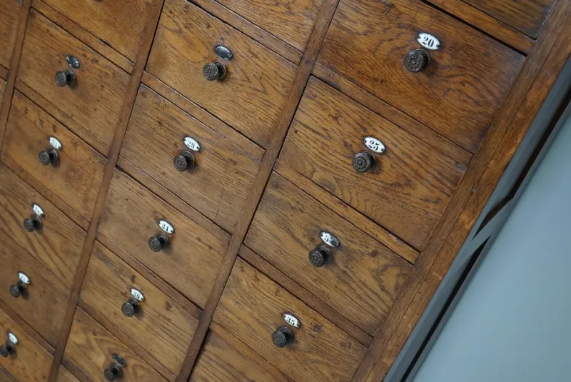 Pamono Large Dutch Oak Apothecary Cabinet with Enamel Shields, 1900s> Cabinets & Wardrobes