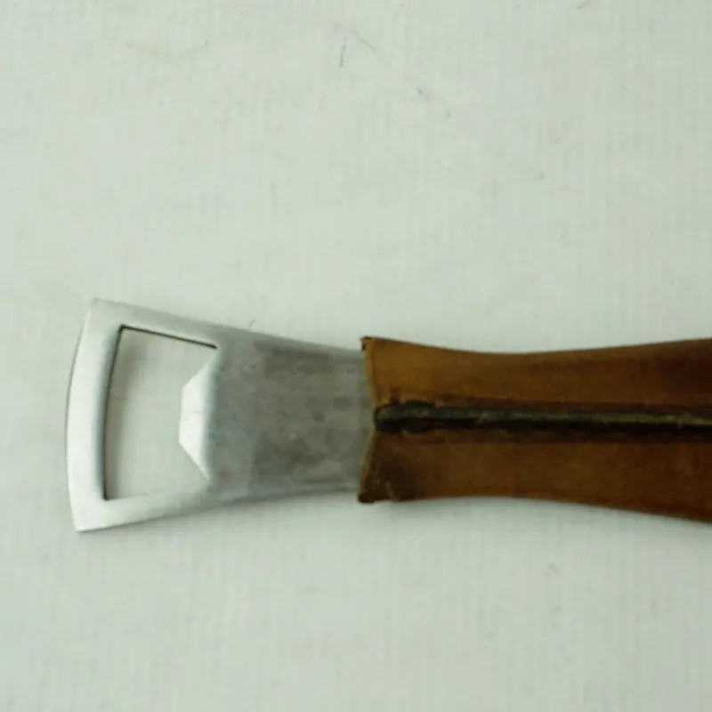 Pamono Mid-Century Austrian Steel and Leather Fish Bottle Opener by Carl Auböck> Cutlery & Serving Utensils