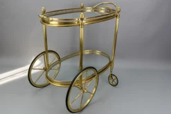 Pamono Mid-Century Modern 2-Tier Brass and Glass Bar Cart in the style of Maison Baguès, 1950s><noscript><img width=
