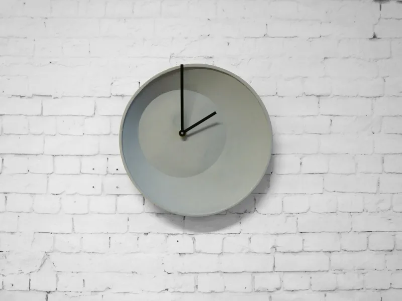 Pamono Off-Center Wall Clock from Studio Lorier> Clocks