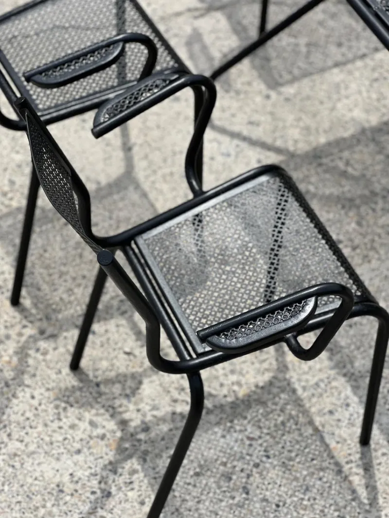 Pamono Perforated Metal Armchairs and Table in the style of Mathieu Matégot, 1950s, Set of 7