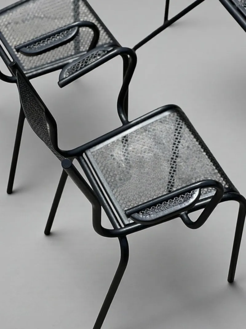 Pamono Perforated Metal Armchairs and Table in the style of Mathieu Matégot, 1950s, Set of 7