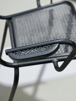Pamono Perforated Metal Armchairs and Table in the style of Mathieu Matégot, 1950s, Set of 7