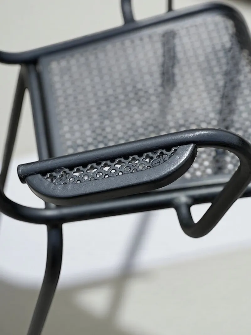 Pamono Perforated Metal Armchairs and Table in the style of Mathieu Matégot, 1950s, Set of 7