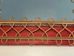 Online Pamono Rattan Mirror on Red Background