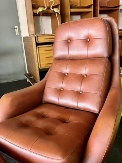 Pamono Set of Vintage Vinyl Leather Lounge Swivel Chair and Ottoman in Cognac Brown, 1970s><noscript><img width=
