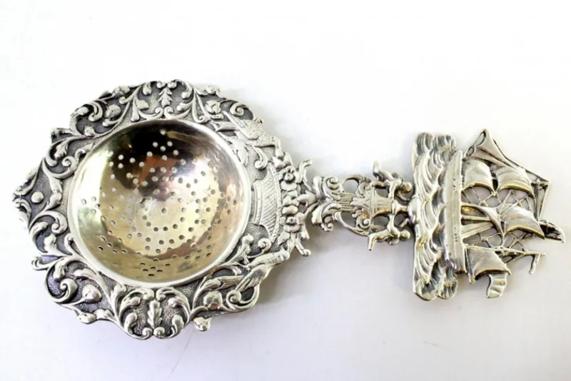 Hot Pamono Silver Tea Strainer with Reliefs, Applications and Caravel Cut-Out Handle