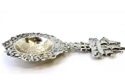 Hot Pamono Silver Tea Strainer with Reliefs, Applications and Caravel Cut-Out Handle