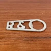 Pamono Vintage Danish Metal Bottle Opener from Bang & Olufsen, 1970s> Cutlery & Serving Utensils