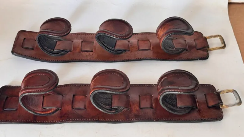 Online Pamono Vintage Leather and Brass Rifle Racks, France, 1970s, Set of 2