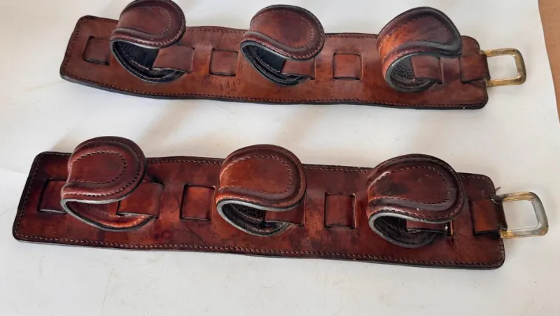 Online Pamono Vintage Leather and Brass Rifle Racks, France, 1970s, Set of 2