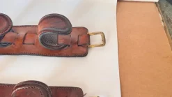 Online Pamono Vintage Leather and Brass Rifle Racks, France, 1970s, Set of 2