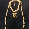 Pamono White and Gold Chanel Necklace Pendant from Chanel> Necklaces