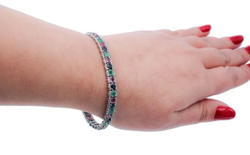 Pamono White Gold Tennis Bracelet with Emeralds and Rubies and Sapphires and Diamonds